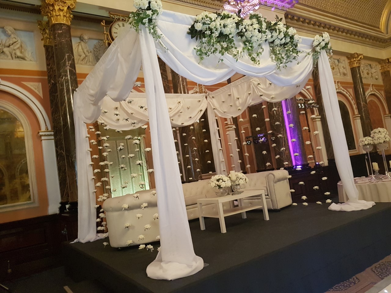 Canopy decorated with ivory roses